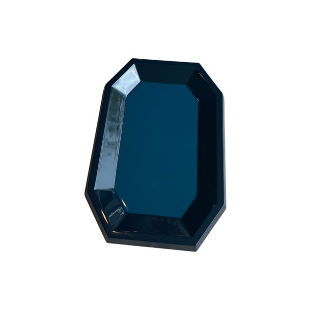 The Jacques Tray is generous and faceted with an inset geometric top. This jewel-like two-tone tray is perfect for your...