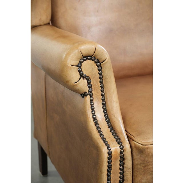 Light Cowhide Wing Armchair with a Timeless English Look and Good Seating Comfort For Sale - Image 11 of 14