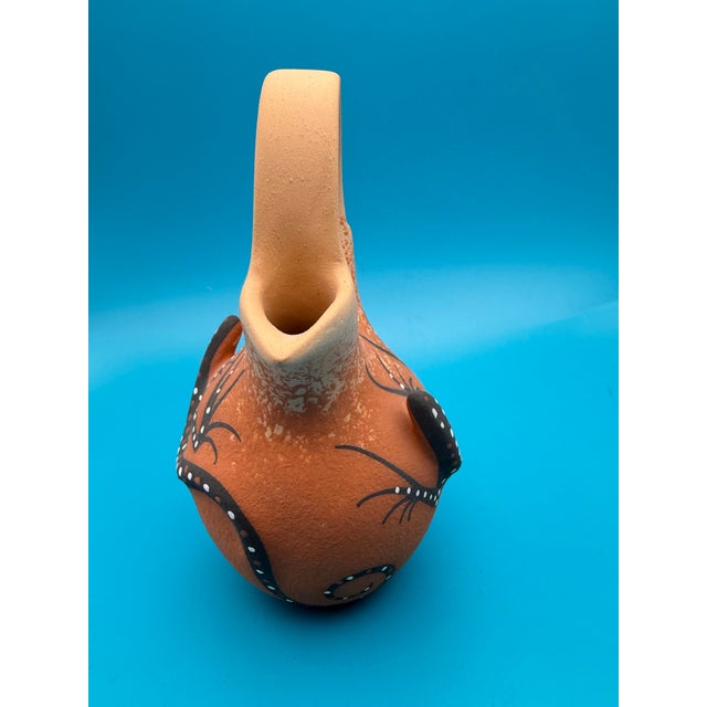 Zuni Native American Wedding Vase with Lizard By Deldrick and Adam Cellicion. The Cellicion family's recognizable three...