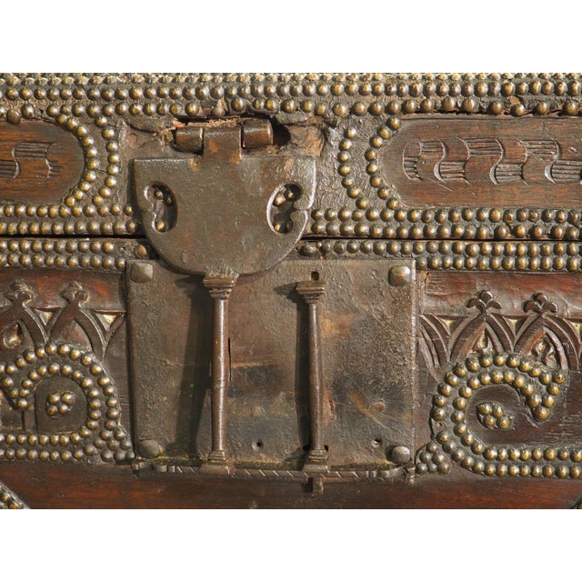 A Fascinating 17th Century Carved and Iron Studded French Trunk, Dated 1632 For Sale - Image 10 of 18