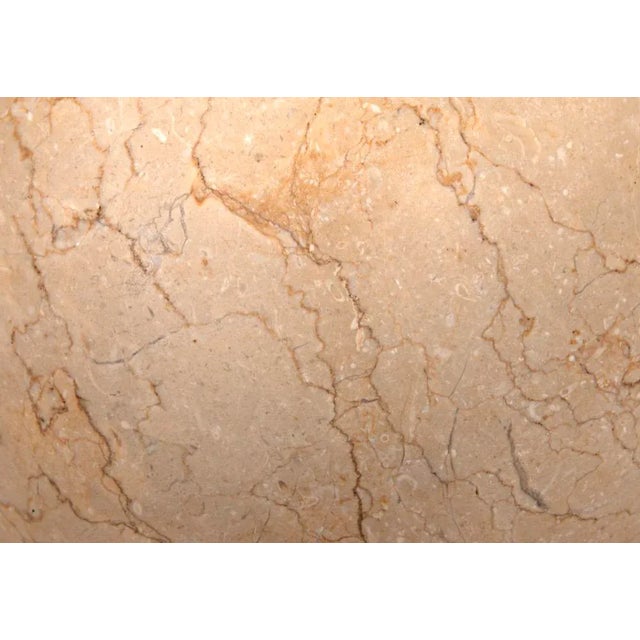 Artisan crafted of solid marble; these accent pieces were designed with simple lines to allow the natural material center...