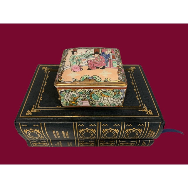 A lovely rose famille trinket box. Hand painted and made in China.