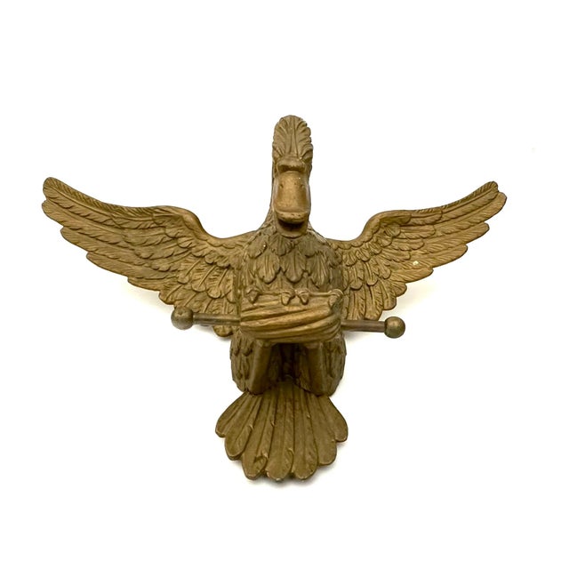 This is an early 19th Century Empire Period gilt wood carved bird corona with wings open. There is an opening in the claws...