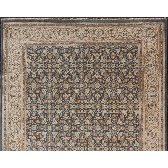 Measures: 9'7 x 11'7 Modern Tabriz Design with Sub-Geometric Herati Design On steel Blue Background. Herati Tabriz, Keivan...