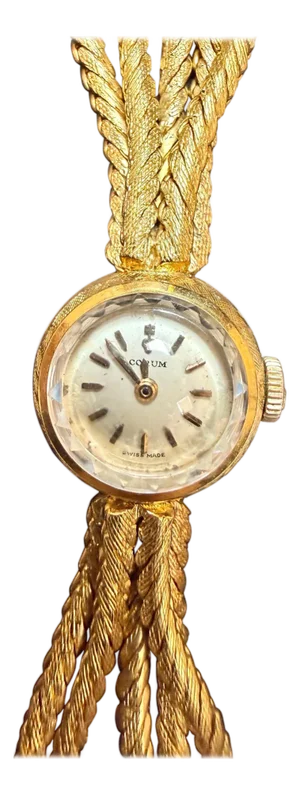 Corum. A lady's 18K gold Multiple Chain bracelet watch 38.5 Gm, 7.25 " Vintage