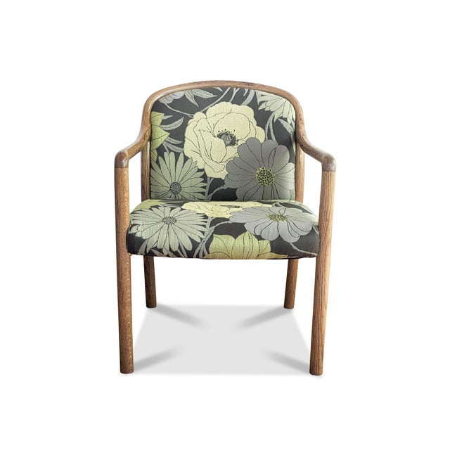 A modern Gunlocke chair with an open arm design. The restored chair has a rounded oak frame with rich patina, and new...