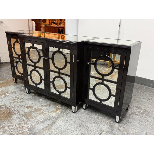 Design Plus Gallery presents the Ava Three-Piece Mirrored Cabinet Set from Worlds Away. This design includes a central...