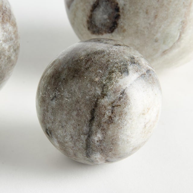 Honed to a semimatte finish, this stunning marble is specifically known for its unique darkBrown to lightBrown broad...
