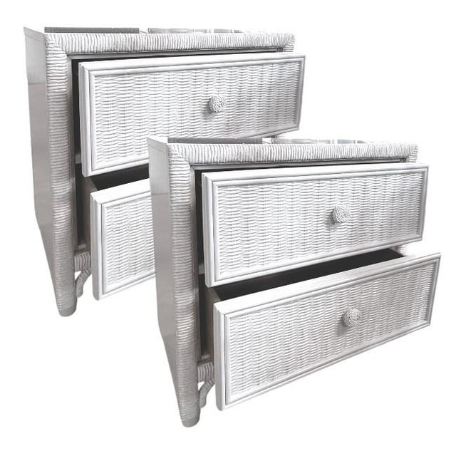 Pair of vintage rattan nightstands professionally refinished in a high-gloss lacquer using Benjamin Moore “Super White.”...