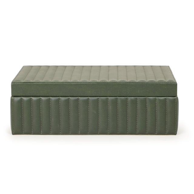 The Eton Storage Box keeps things tidy without ever feeling boring. Wrapped in rich green ribbed vegan leather, it feels...