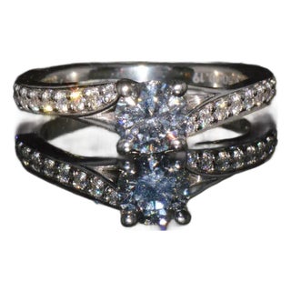 GIA Certified Natural 0.69CTS VVS E Diamond Solid 950 Platinum Designer Ring, size 4 For Sale