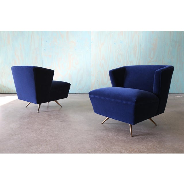 A pair of swivel lounge chair designed by Henry P Glass for J.L. Chase Co. for the forecast group. This example is the TV...