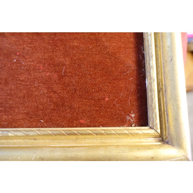 19th-century wooden frame with a distinctive molded finish with antique crucifix (Christ is missing) antique velvet lining...