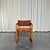 Set of four Scandinavian teak sleigh chairs, fully reupholstered in a tiger-print jacquard fabric. These chairs are in...
