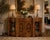 An exceptional antique English 4 door serpentine marquetry credenza of exhibition quality, crafted in the French taste and...