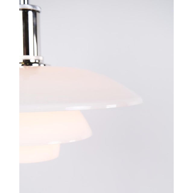 Ph 4½-4 pendant designed by poul henningsen for louis poulsen. The lamp is made with hand-blown three-shade screens in...