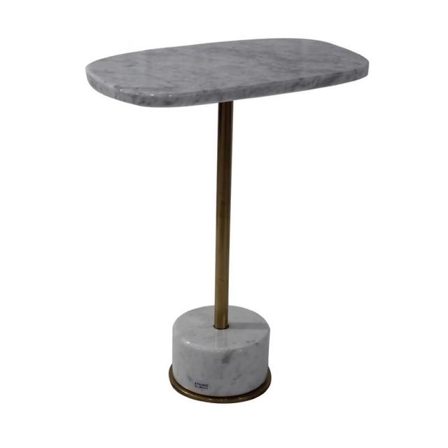 Coffee table in Bianco Carrara marble, is worked with numerical control machines and finished by expert craftsmen. It...