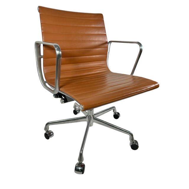 These beautiful authentic Mid-Century Modern Eames Herman Miller Executive Aluminum Group chairs by Knoll are upholstered...