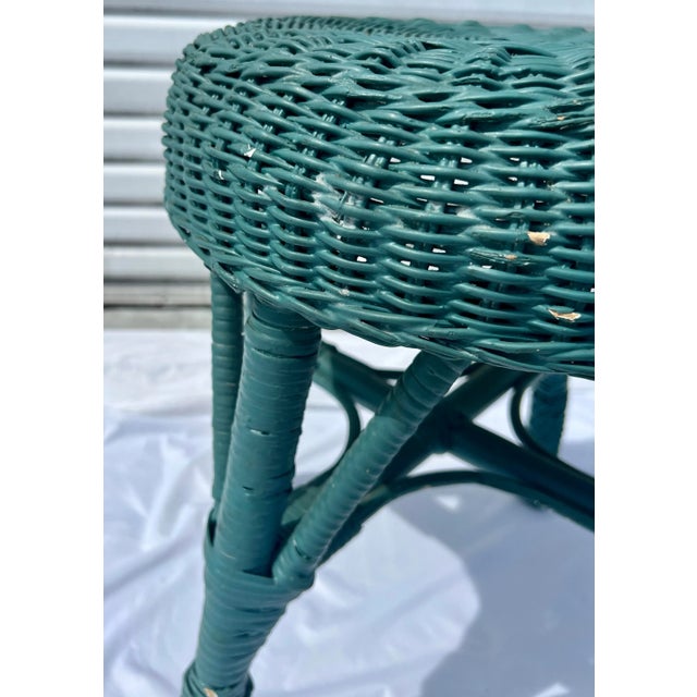 Vibrant Turquoise vintage stool made of bamboo and woven rattan and wicker is in the style of Tony Paul and Franco Albini....
