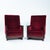 A striking pair of Amsterdam School armchairs, defined by their sculptural presence and expressive craftsmanship....