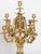Napoleon iii-era gilded bronze mantelpiece set. Mantelpiece set consisting of a clock and two candelabra in gilded bronze...