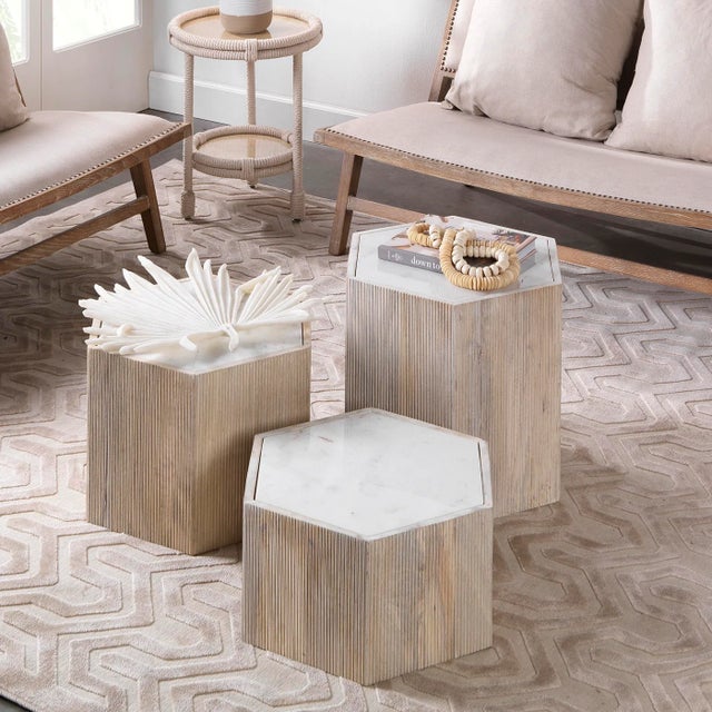Simple, yet stunning our Argan Hexagon tables use a ribbed washed wood and white marble to create a brilliant side table...