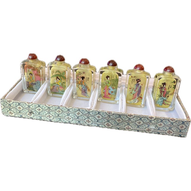 This sset of six Asian snuff bottles features the Beauties of Dream Red Mansion design, with intricate inside painting and...