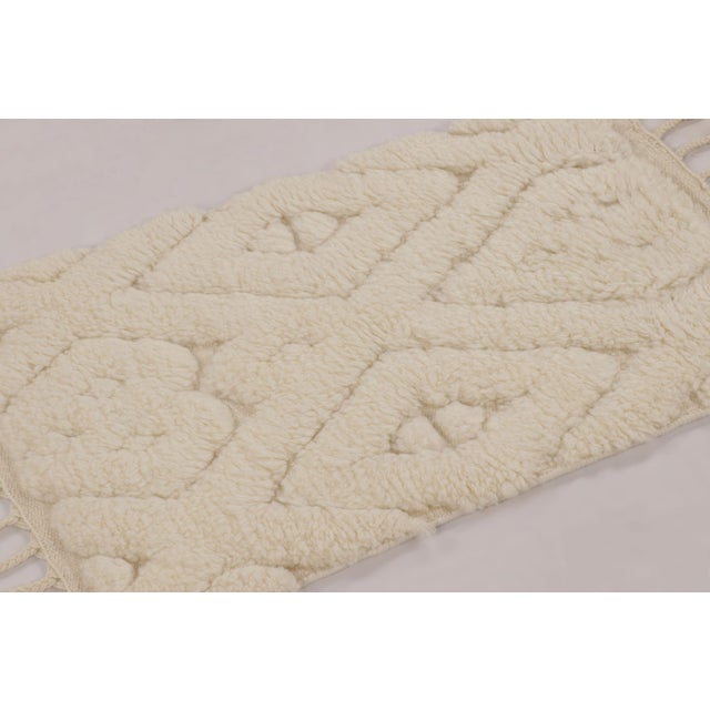 This 2x3 Moroccan-style rug is a plush, textural composition , handwoven in wool in India. Drawing from the rich heritage...