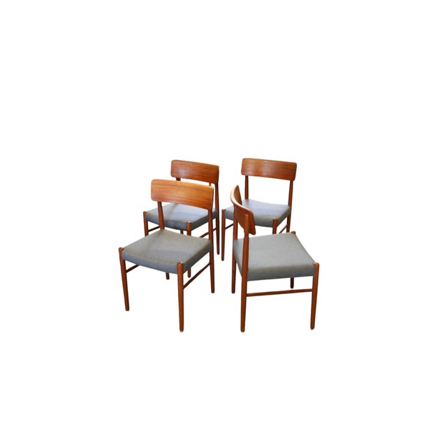 Stylish Danish chair in teak with a warm, rich tone and beautiful grain. The seat is newly upholstered in a high-quality...
