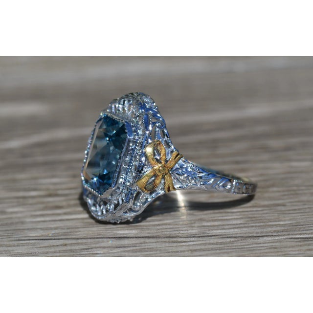 The Lamphere Road Ladies Antique 14K Two Tone Ring set with Laboratory Grown Spinel. Crafted in 14 karat white gold, this...