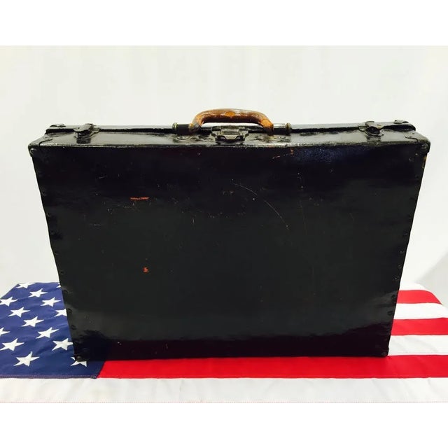 Antique Black Lacquered Suitcase. Original metal hardware. Stunning patina. Original blue felt cloth inside. Original...