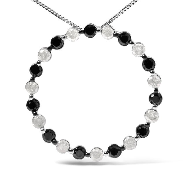 Discover elegance spun into a circle of brilliance with this striking pendant necklace, masterfully crafted in rhodium-...