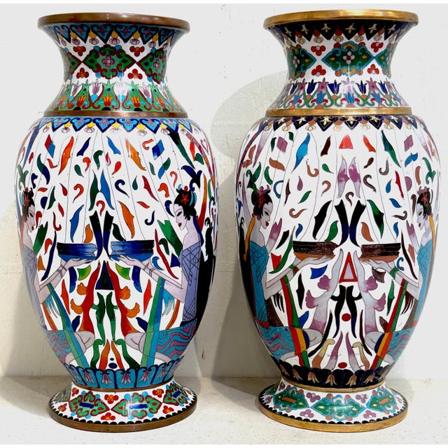 Pair of Chinese Cloisonné Vases with Egyptian Revival Motifs, Late-20th Century A dramatic pair of Chinese cloisonné...