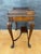 Elegant Louis XV style carved wood side table featuring a refined gallery top and gracefully curved cabriole legs. Richly...