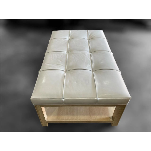 2020s Highland House 1399-48 Franco Cocktail Ottoman With Off-White Tufted Leather Cushion and Lower Oak Shelf For Sale - Image 5 of 18