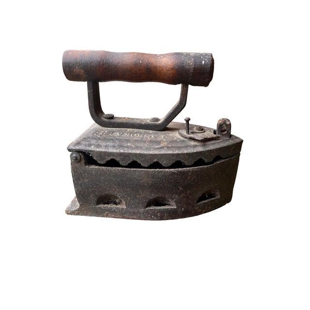 It’s a beautiful relic from the late 19th to early 20th century. Featuring a solid wooden handle and vented body designed...