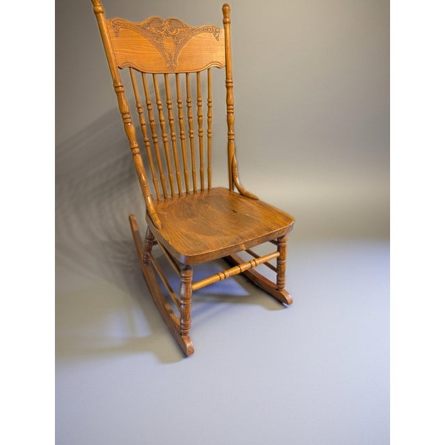Farmhouse Vintage Pressed Back Oak Rocking Chair – Ornate Wooden Windsor Spindle Rocker. For Sale - Image 3 of 4