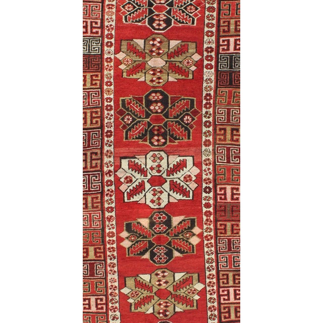 Antique Kazak Runner With Seven Medallions and Tribal Design in Red Background For Sale - Image 4 of 8