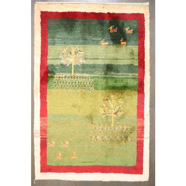 a 21st Century 100% vegetabled dyed Persian Gabbeh in predominantly green Details rug no. j4797 size 2' 8" x 3' 10" (81 x...