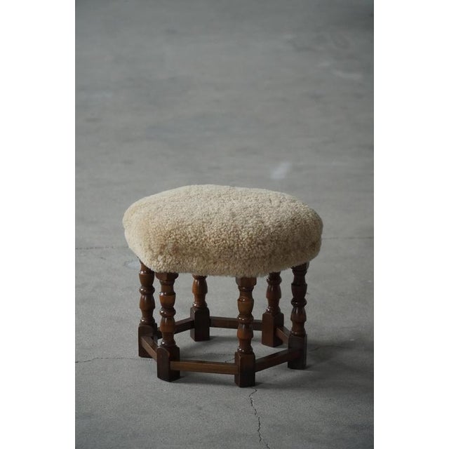 A charming and sculptural stool, crafted by a Danish cabinetmaker during the 1950s. The stool features a distinctive...