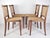 Bring an organic, highly textured look to your dining room with this rare set of four raffia-woven dining chairs....