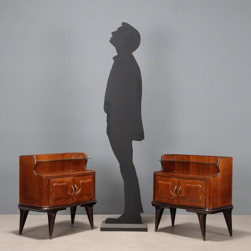 Pair of vintage bedside tables with exotic wood veneer, hinged doors, brass handle, glass riser. This piece is attributed...