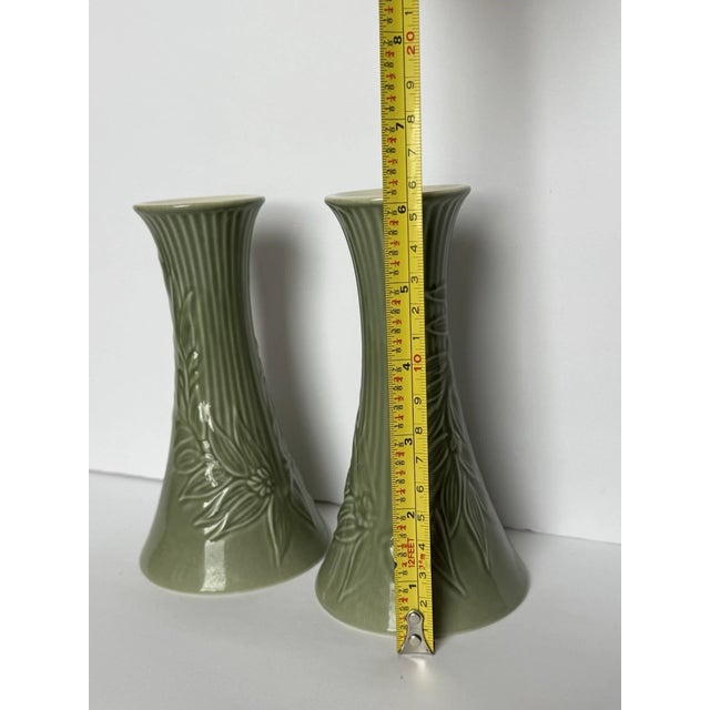 Add a touch of timeless elegance to your home with this beautiful pair of vintage Lenox candle holders in the sought-after...