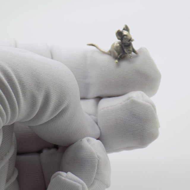A marvel of florentine micro-silversmithing, this vintage silver figurine captures a sweet field mouse crafted in solid...