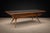 Attributed to Giuseppe Scapinelli (1911–1974), this coffee table exemplifies the sculptural clarity that distinguish the...