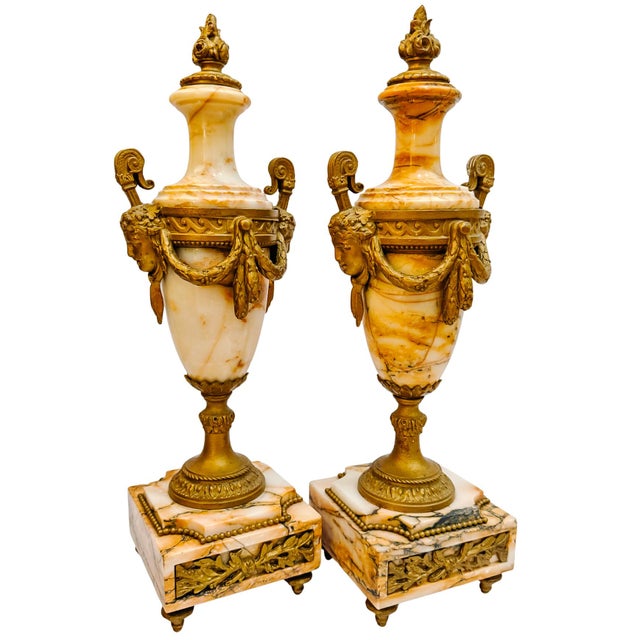 Pair of 19th-century French cassolettes epitomizing the timeless elegance of the Louis XVI style and acquired in Paris....