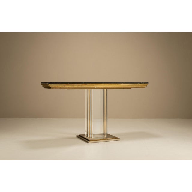 This sculptural console table by Belgochrom brings together material contrast and architectural clarity. A fine example of...