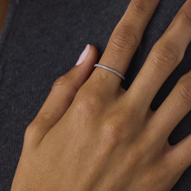 This elegant contemporary diamond half eternity band is a timeless design from the 2020’s, featuring 36 round brilliant...