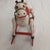 The 1979 Enesco Musical Wooden Rocking Horse Music Box plays "Toy Land" and Works. It is a vintage collectible item...