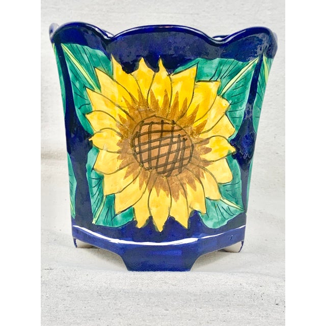 Fun and colorful vintage planter. Features sunflowers. Has a hole for drainage. Could be used as a planter, Cachepot (with...